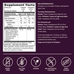 Black supplement facts label with white text, showing serving size, calories, sugars, and black elderberry details, plus usage recommendations and four icons at the bottom for dairy free, gluten free, vegan, and zero sugar.