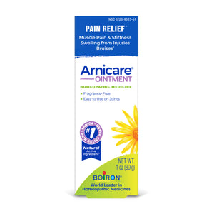 A box of Boiron Arnicare Ointment Pain Relief homeopathic medicine, featuring a white and blue design with a yellow acorn flower illustration and a green Boiron logo at the bottom.