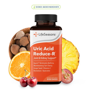 LifeSeasons Uric Acid Reduce-R dietary supplement bottle, surrounded by its natural ingredients including cherries, an orange, a pineapple, and a bowl of almonds, on a solid white background.