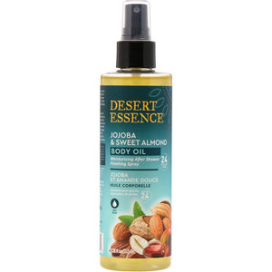 A bottle of Desert Essence Jojoba & Sweet Almond Body Oil