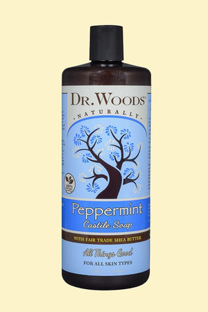 A bottle of Dr. Woods Castile Liquid Peppermint with Fair Trade Organic Shea Butter 32 oz