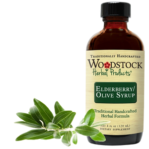 A bottle of Woodstock Herbal Products Elderberry Olive Syrup