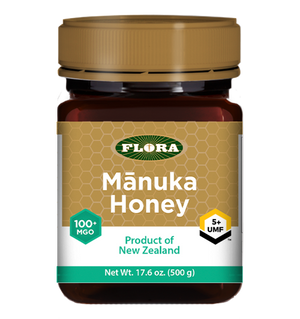 A bottle of Flora Manuka Honey MGO 100+/5+ UMF 17.6 oz
